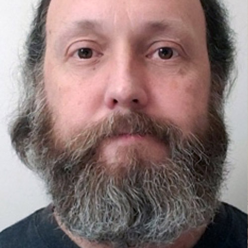 A headshot of Tony A. Grizzel